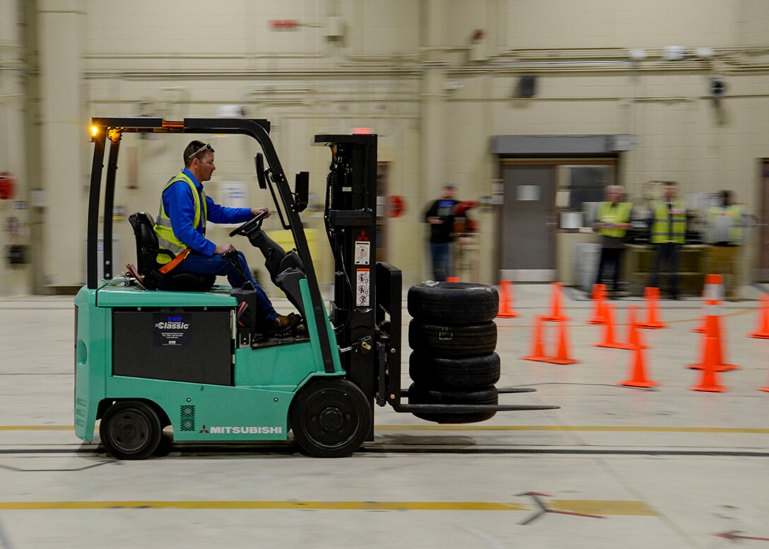 Equipment Specialist David Gwartney, of the DLA Disposition Services at Arifjan site in Kuwait, navigates the “Rubber Meets the Road” challenge on his way to a 2nd place finish at the inaugural Material Handling Equipment Rodeo in Battle Creek Oct. 25.