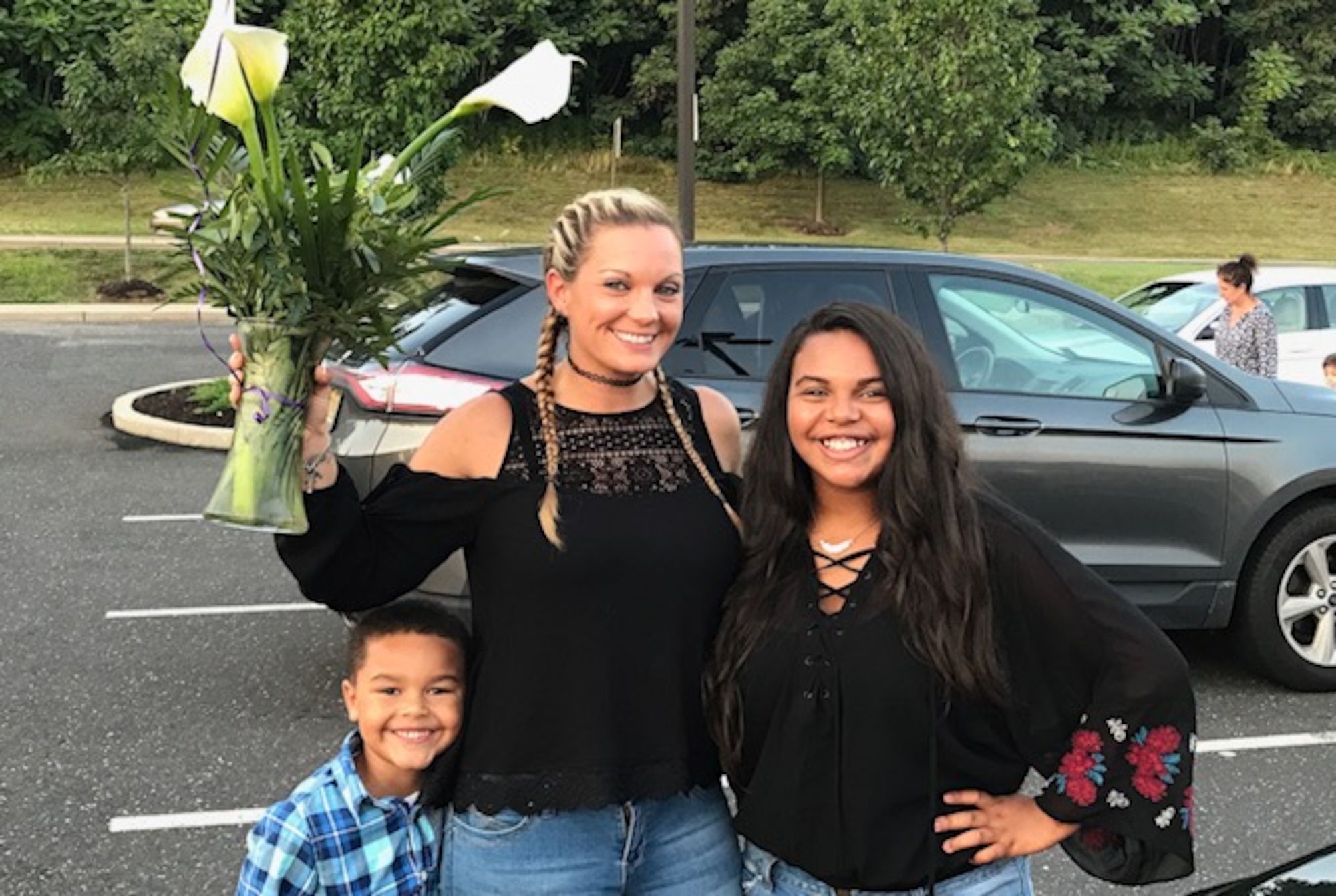 U.S. Air Force Master Sgt. Michelle Humphrey, 87th Air Base Wing Staff Agencies first sergeant, poses with her children, Hayleigh and Kosey Justice.