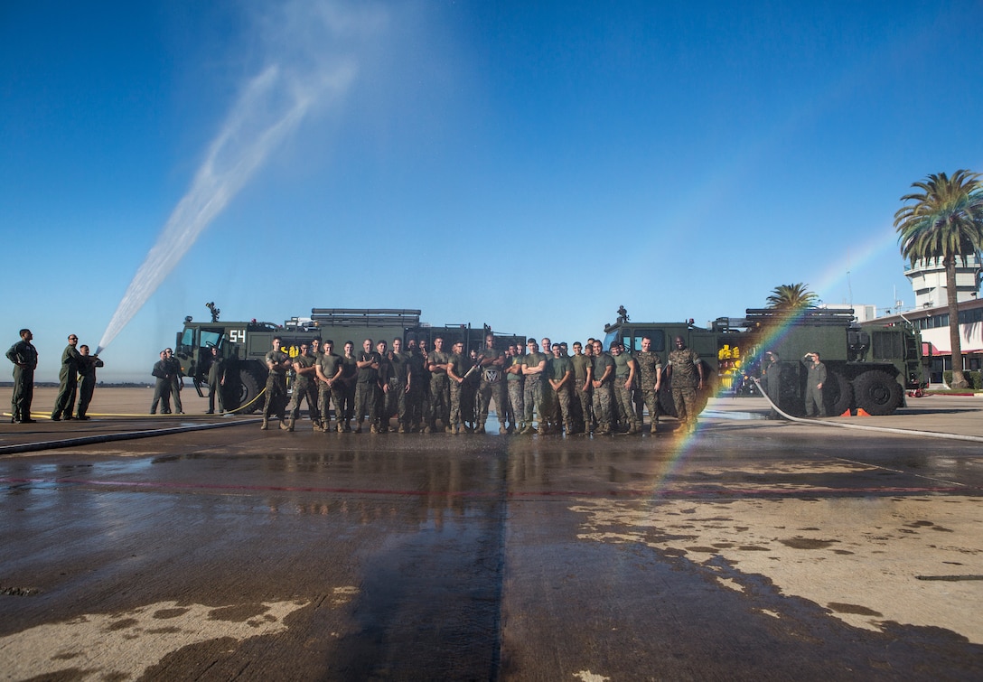 Marines that participated in the warrior challenge pose for a group photo at Marine Corps Air Station Miramar, Calif., Nov. 26. The warrior challenge is held every month by Headquarters and Headquarters Squadron to build unit cohesion and boost morale through various unit competitions. (U.S. Marine Corps photo by Cpl. Becky Cleveland)