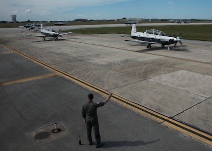 T-6 Texan IIs from the 559th Flying Training Squadron and the 39th FTS participated in an “Elephant Walk” Oct. 26, 2018, at Joint Base San Antonio-Randolph, Texas. An Elephant Walk is more commonly known as a “show of force,” but the squadrons here conducted one to get in touch with their heritage. The exercise was called a “Goat Trot/Snake Slither” as the 559th are the fighting Billy Goats and the 39th are the Cobras.