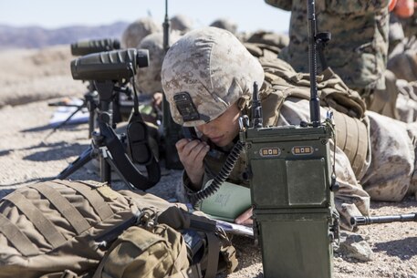 U.S. Marine Corps Sgt. Sarah Brinkerhoff, a forward observer with Fire Support Team, Company A, 1st Battalion, 8th Marine Regiment (1/8), 2nd Marine Division, communicates with the mortar gun line during Integrated Training Exercise (ITX) 1-19 at Twentynine Palms, Calif., Oct 19, 2018. The large-scale exercise allows infantry units to bolster their combat capabilities in a desert environment in preparation for potential global contingencies. (U.S. Marine Corps photo by Lance Cpl. Tyler M. Solak)