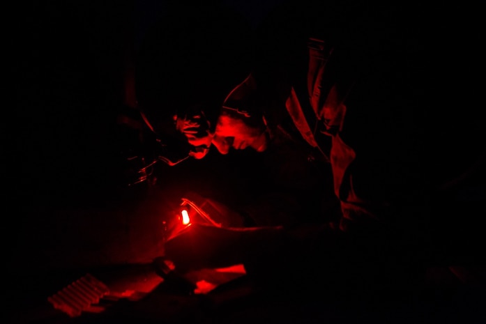 U.S. Marine Corps 2nd Lt. Jacob Martin, the team leader of Fire Support Team, Company A, 1st Battalion, 8th Marine Regiment (1/8), 2nd Marine Division, plans a time on target schedule during Integrated Training Exercise (ITX) 1-19 at Twentynine Palms, Calif., Oct 23, 2018. The large-scale exercise allows infantry units to bolster their combat capabilities in a desert environment in preparation for potential global contingencies. (U.S. Marine Corps photo by Lance Cpl. Tyler M. Solak)