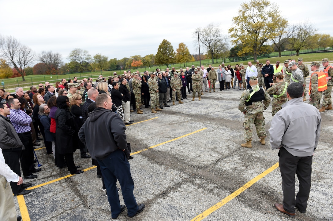 Soldiers and staff from the 85th Support Command and the Defense Contract Management Agency-Chicago conduct an after action review following an active shooter training exercise at the 85th Support Command headquarters, Oct. 30, 2018.