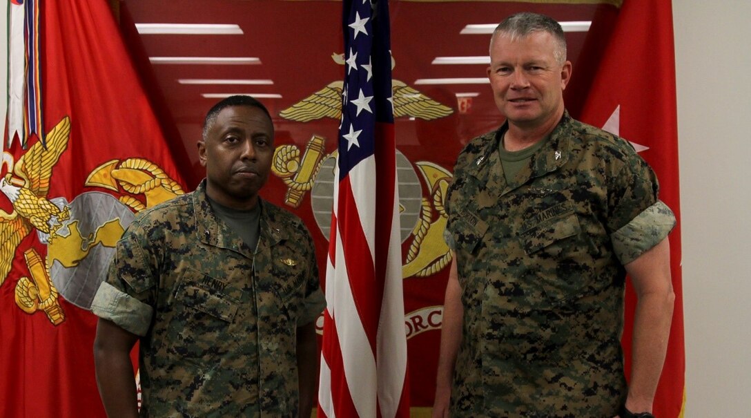 Brig. Gen. Dimitri Henry, director of intelligence at Headquarters Marine Corps, meets Col. Timothy Burton, deputy commander at U.S. Marine Corps Forces Korea, during his visit to the Korean peninsula here, Oct. 19.  Henry also spoke at an intelligence symposium hosted by MARFORK leadership during his visit to the command. (U.S. Marine Corps photo by Sgt. Nathaniel Hanscom/Released)