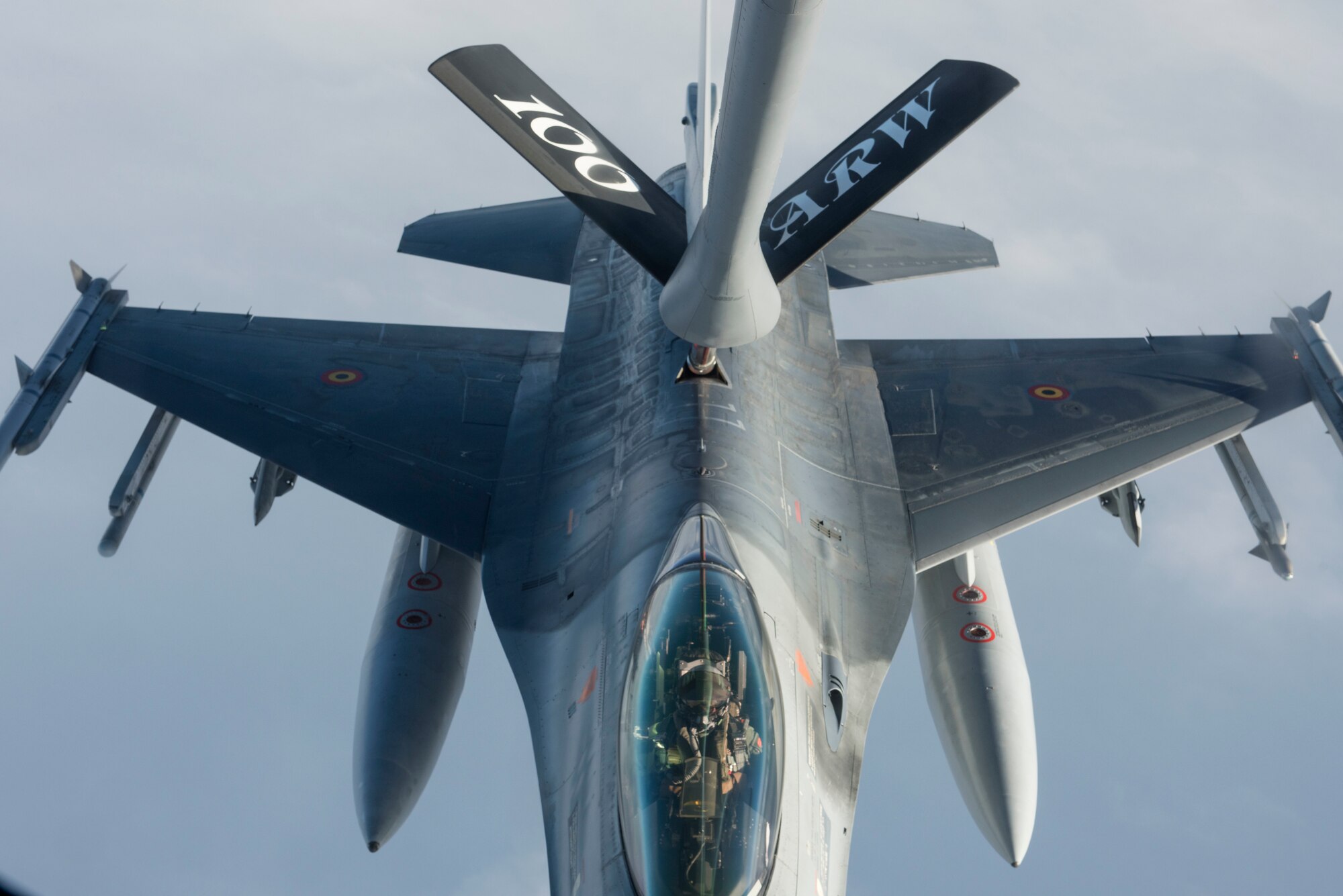 A Belgian F-16 Fighting Falcon receives fuel from a U.S. Air Force KC-135 Stratotanker during Exercise Trident Juncture 18, in Swedish airspace, Oct. 30, 2018. The exercise is the largest NATO exercise since 2015, and includes more than 50,000 military members from 31 countries. (U.S. Air Force photo by Senior Airman Luke Milano)