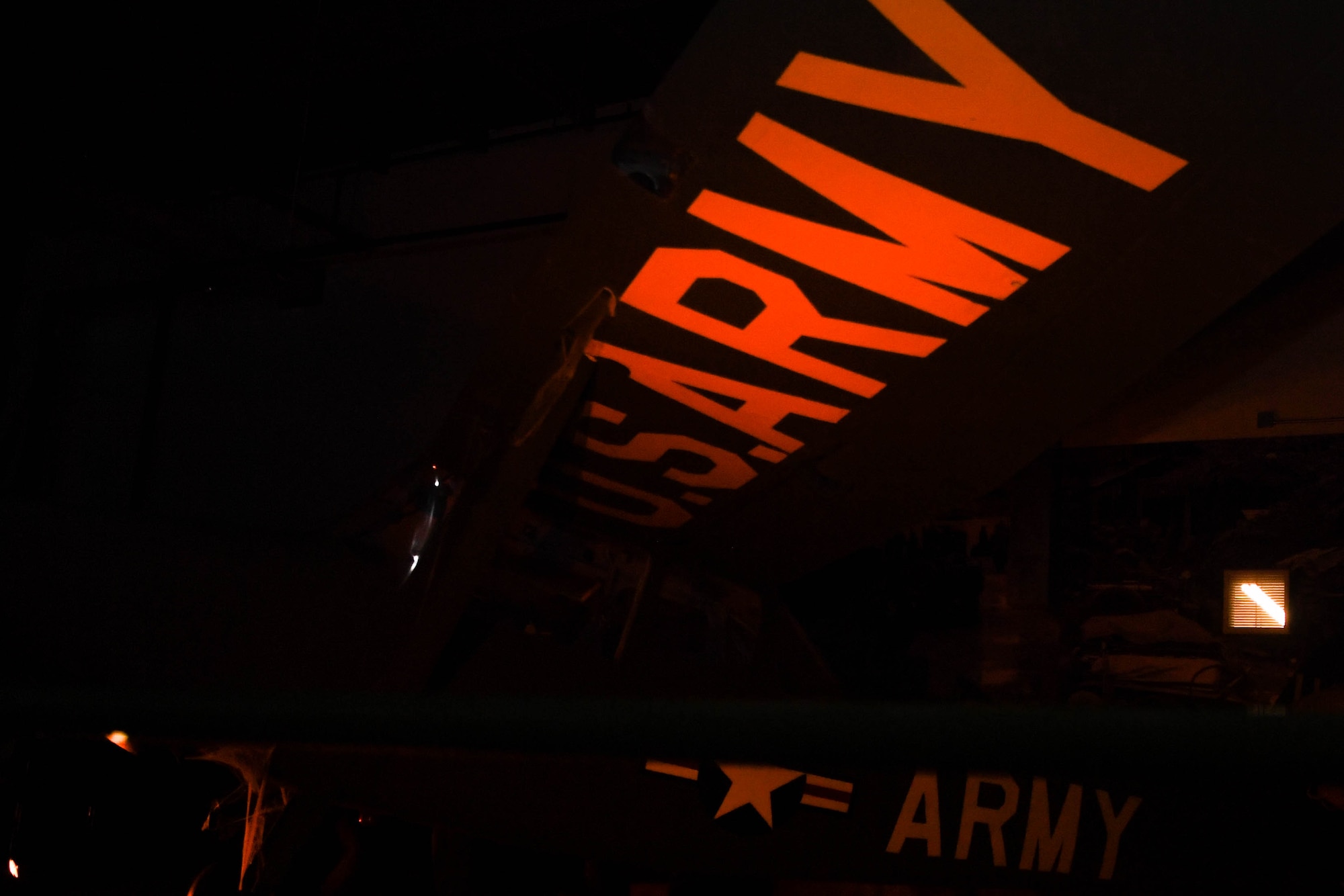 A U.S. Army aircraft is showcased during the Night at the Transportation Museum event at Joint Base Langley-Eustis, Virginia, Oct. 29, 2018. The U.S. Army Transportation Corps has played a vital role in every major conflict the United States has been involved in since the Revolutionary War. (U.S. Air Force photo by Senior Airman Derek Seifert)