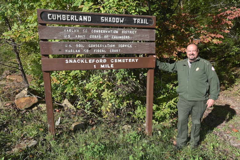 Park Ranger Dave Robinson, U.S. Army Corps of Engineers Nashville District, talked about being safe on the Cumberland Shadow Trail while standing next to the trailhead sign in Smith, Ky., Oct. 18, 2018. The trail is nearly five miles long and winds along the shoreline, hilltops and ridges overlooking Martins Fork Lake. (USACE photo by Lee Roberts)