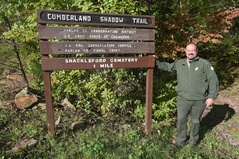 Park Ranger Dave Robinson, U.S. Army Corps of Engineers Nashville District, talked about being safe on the Cumberland Shadow Trail while standing next to the trailhead sign in Smith, Ky., Oct. 18, 2018. The trail is nearly five miles long and winds along the shoreline, hilltops and ridges overlooking Martins Fork Lake. (USACE photo by Lee Roberts)