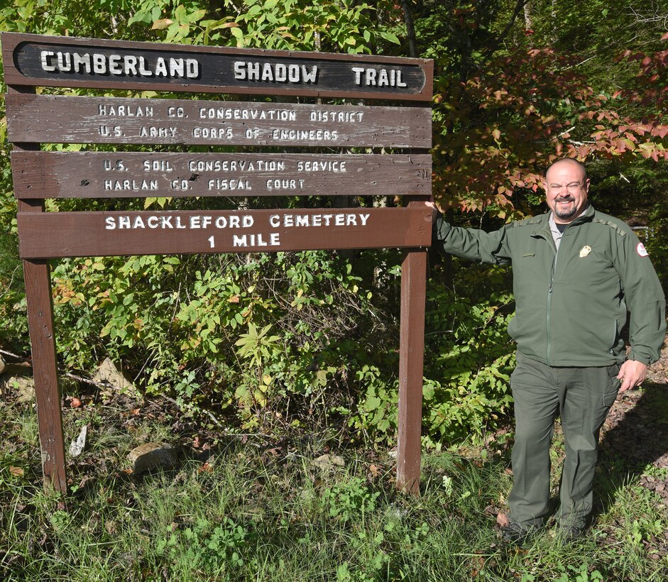 Park Ranger Dave Robinson, U.S. Army Corps of Engineers Nashville District, talked about being safe on the Cumberland Shadow Trail while standing next to the trailhead sign in Smith, Ky., Oct. 18, 2018. The trail is nearly five miles long and winds along the shoreline, hilltops and ridges overlooking Martins Fork Lake. (USACE photo by Lee Roberts)