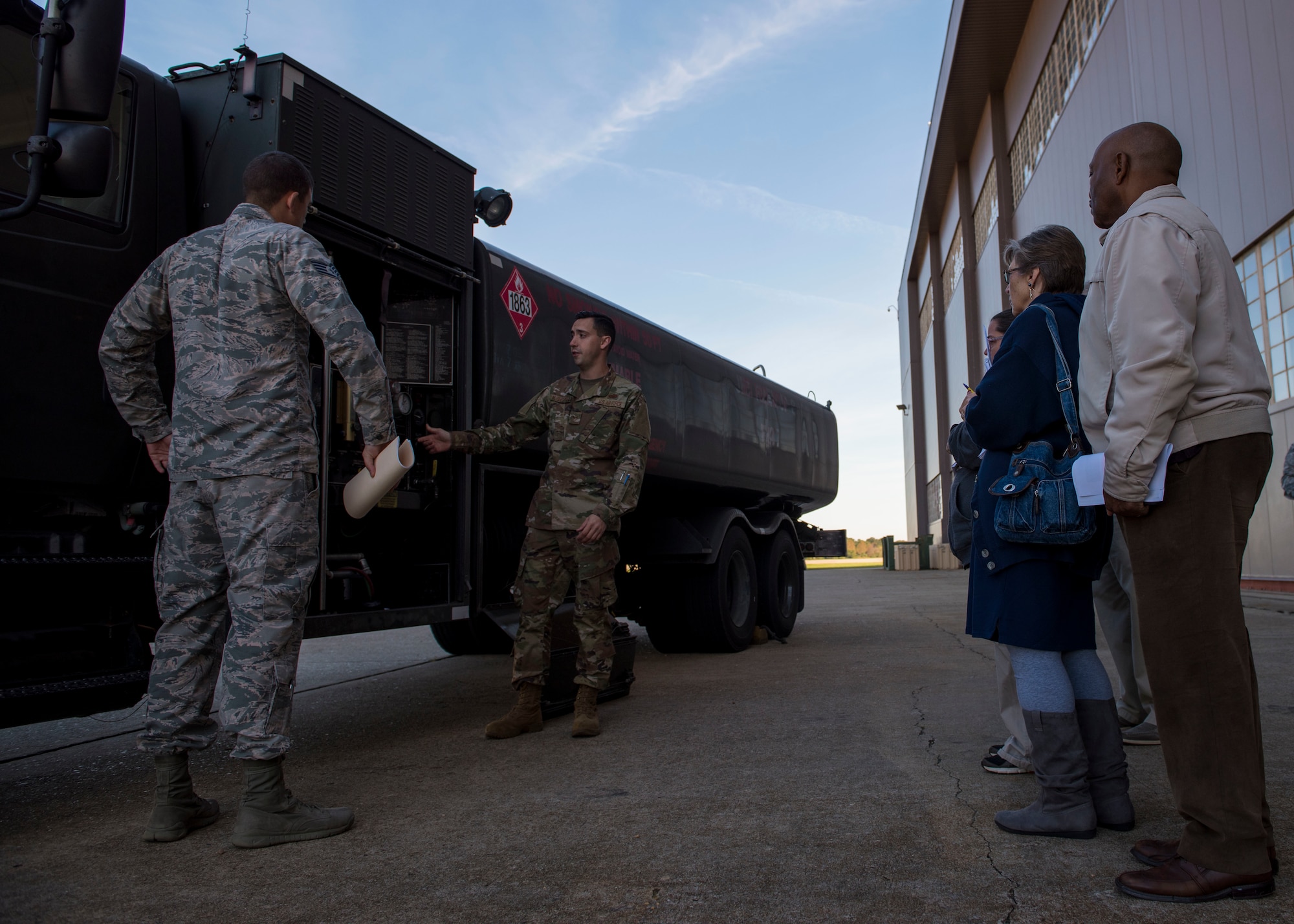 U.S. Air Force Airmen assigned to the 733rd Logistics Readiness Squadron demonstrate aspects of vehicle maintenance for Academy Hampton teachers at Joint Base Langley-Eustis, Virginia, Oct. 25, 2018.