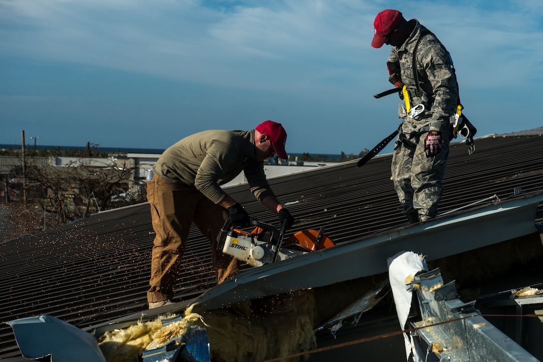 Airmen from 823rd RED HORSE Squadron, perform structural repairs at the gas station Oct. 22, 2018, at Tyndall  Air Force Base, Florida, after Hurricane Michael swept the area.