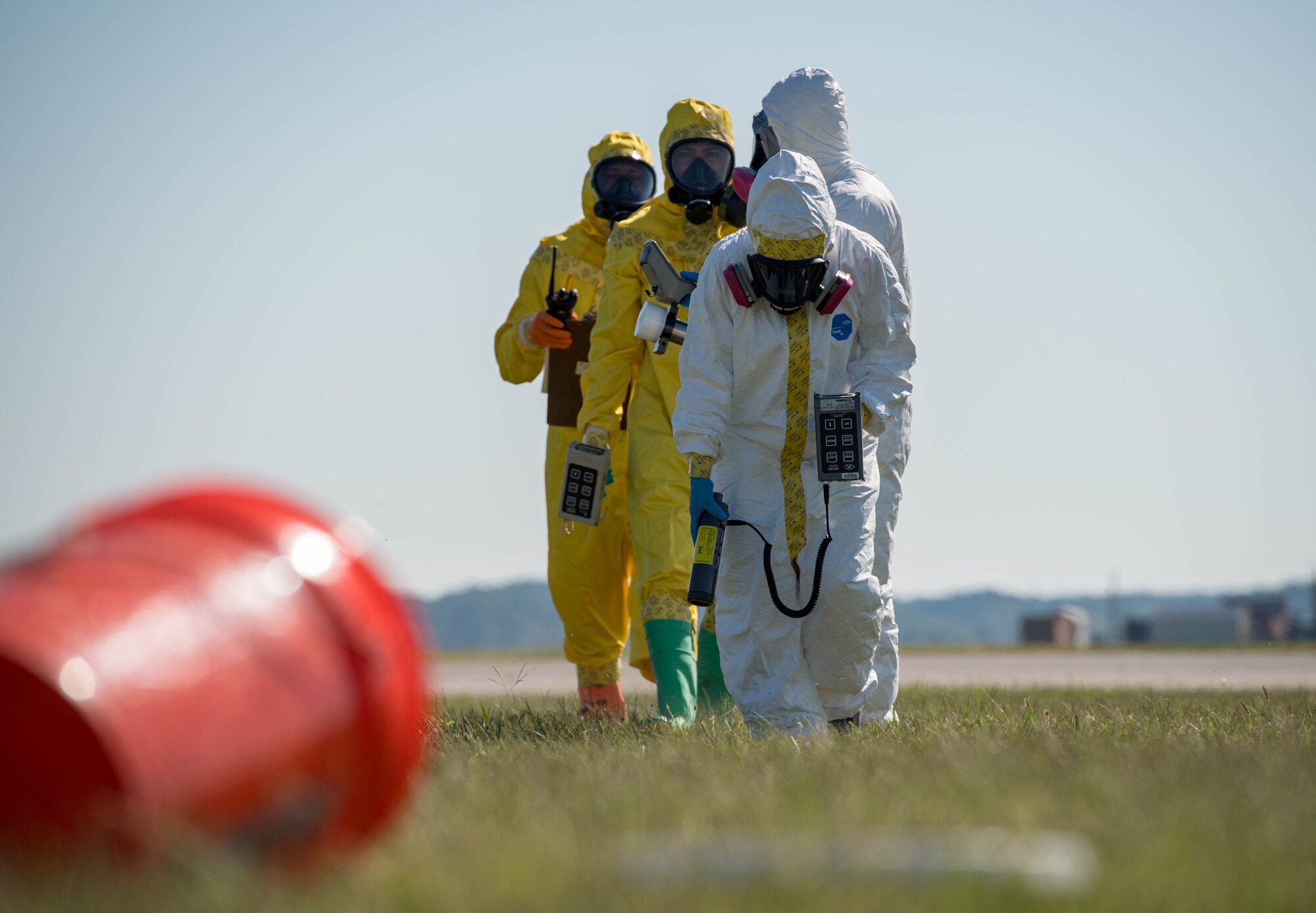 U.S. Air Force Airmen assigned to the 633rd Civil Engineer Squadron and the 633rd Aerospace Medicine Squadron perform an eight-leg radial survey during a joint radiological response training at Joint Base Langley-Eustis, Virginia, Oct. 3, 2018.