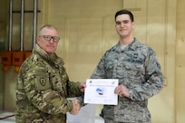 Senior Airman Paul Seaman, 773d Civil Engineer Squadron, is recognized as the Arctic Warrior of the Week at Joint Base Elmendorf-Richardson, Alaska, Oct. 30, 2018. The Arctic Warrior of the Week is an award highlighting JBER's top performing Airmen.