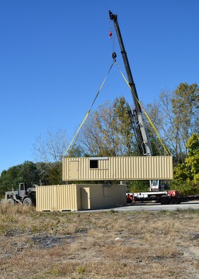 The National Center for Medical Readiness received delivery of a Conex “hotel,” Oct. 23, 2018, which includes three 12,000-pound structures, to be incorporated with future training and testing events taking place at the tactical training facility. (U.S. Air Force photo/Lori Hughes)