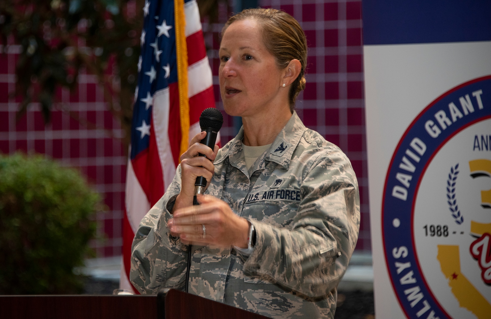 U.S. Air Force Col. Kristen Beals, commander, 60th Medical Group, delivers commentary during a historically significant event, Oct. 30, 2018, Travis Air Force Base, Calif.  David Grant U.S. Air Force Medical Center celebrated its 30th Anniversary with cake and testimonials from past and present patients. DGMC is the Air Force's flagship treatment facility, in the United States, providing a full spectrum of health care and patient-centered treatment to a prime service area throughout eight western states. (U.S. Air Force Photo by Heide Couch)