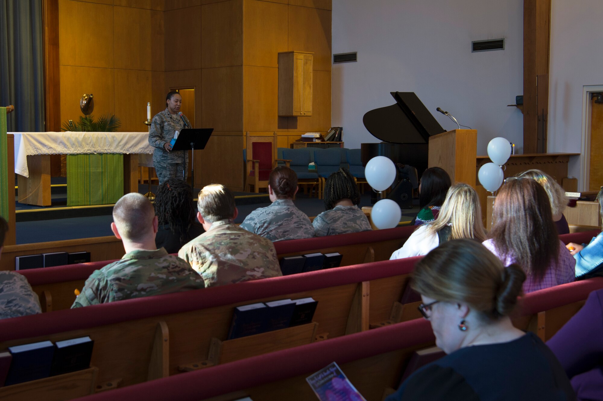 Team Shaw members come together in order to show their respect to survivors of domestic violence at Shaw Air Force Base, S.C., Oct. 30, 2018.