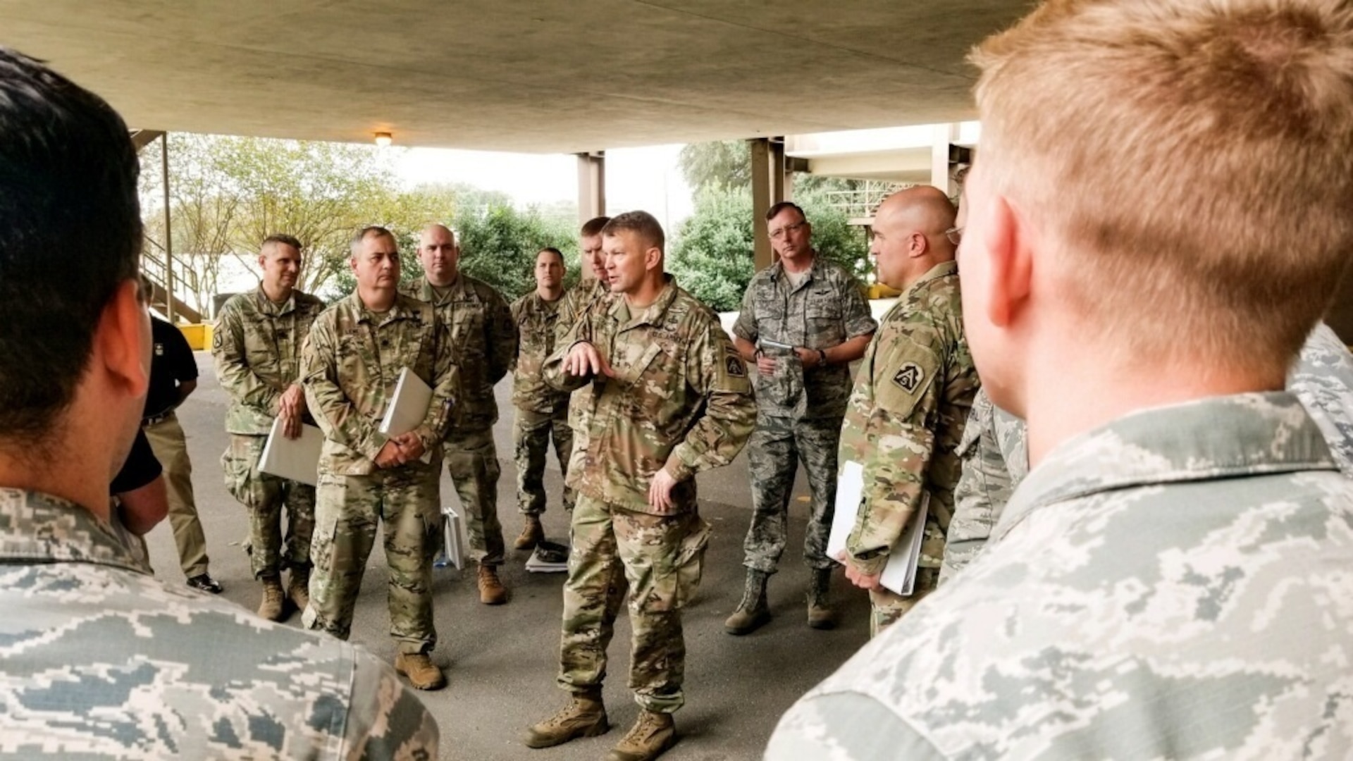 Army Lt. Gen. Jeffrey Buchanan, U.S. Army North (Fifth Army) commanding general, speaks with Joint Forces Land Component personnel and U.S. Air Force attorneys at Joint Base San Antonio-Lackland Oct. 31 that are supporting Operation Faithful Patriot. OFP is the Department of Defense's support to the Department of Homeland Security and Customs and Border Protection in order to provide national security at the Nation’s southern border.