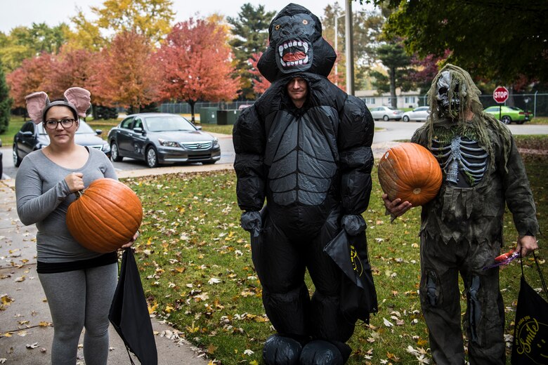 Winners from Grissom's Halloween 5K event show off their pumpkin prizes at Grissom Air Reserve Base, Ind., Oct. 31, 2018. Over a dozen runners participated, and attendees were encouraged to run in costume. (U.S. Air Force photo / Senior Airman Harrison Withrow)
