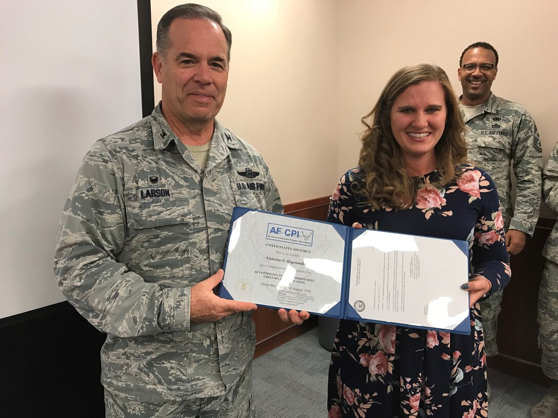 Wing process manager receives green belt certification