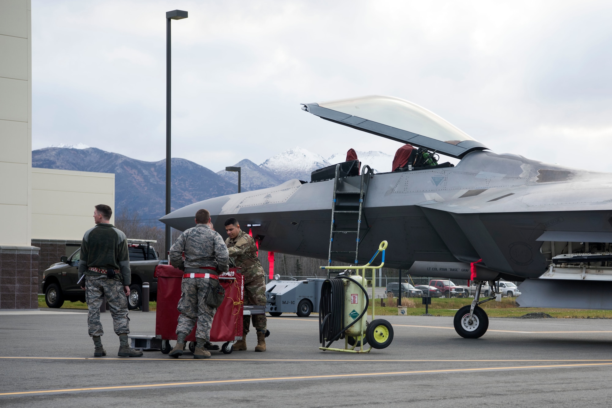 Service members from the 90th Aircraft Maintenance Unit prepare their tools for the quarterly load competition at Joint Base Elmendorf-Richardson, Alaska, Oct. 26, 2018. During the competition, two teams tested their skills as load crew members for the F-22 Raptor. The event demonstrates the skill level and knowledge of all JBER aircraft maintainers.