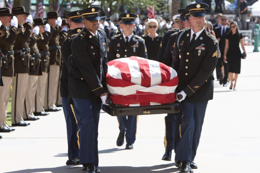 Soldiers carry the flag-draped casket of Sen. John S. McCain III.