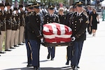 Soldiers carry the flag-draped casket of Sen. John S. McCain III.