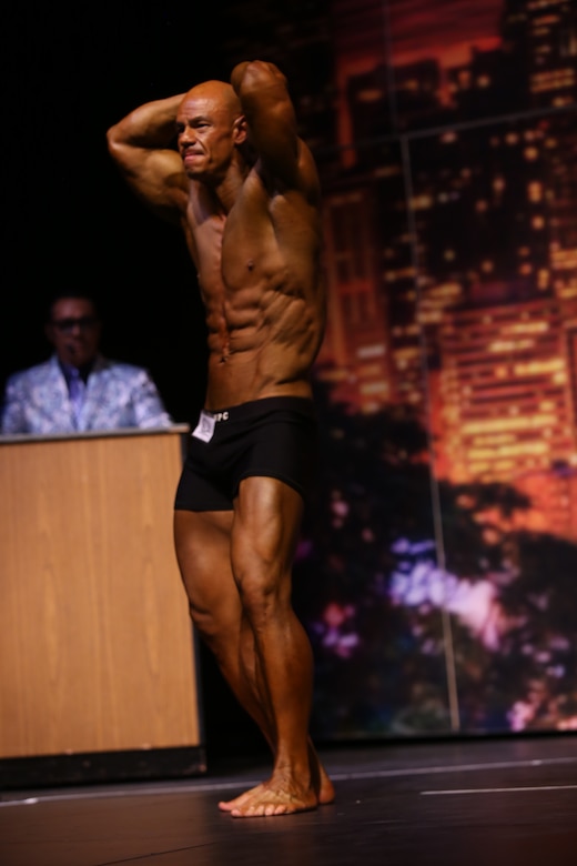 Maj. Danny Kang, Far East District plans and operations officer, poses during the 2018 Washington State Open Bodybuilding Championships – National Physique Committee National Qualifier on Aug. 4, 2018 in Auburn, Washington