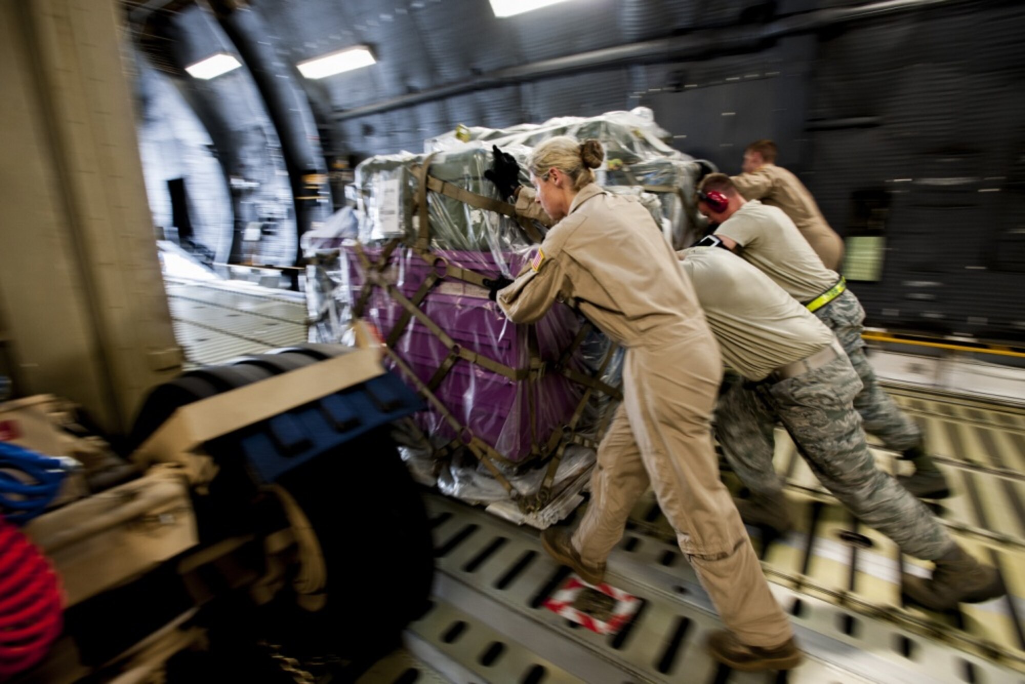 Airmen from the 39th Logistics Readiness Squadron, the 728th Air Mobility Squadron and the 9th Airlift Squadron unload equipment from a C-5M Super Galaxy from Dover Air Force Base, Del., in support of Operation Inherent Resolve Aug. 9, 2015, at Incirlik Air Base, Turkey. The U.S. Air Force deployed six F-16 Fighting Falcons from Aviano Air Base, Italy, support equipment and approximately 300 personnel to Incirlik AB.