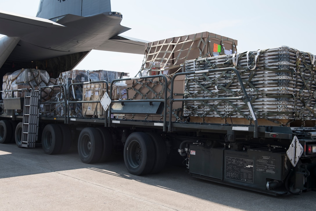 Imported shipments are unloaded off of a cargo plane at Incirlik AB
