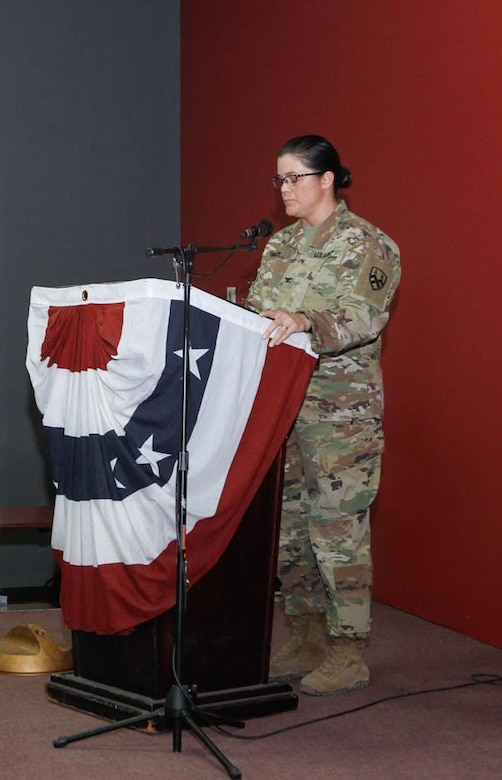 U.S. Army Col. Robin Julch commander of 310th Human Resources Sustainment Center, 1st Sustainment Command (Theater) gives the keynote address during the Women’s Equality Day observation at Camp As-Sayliyah, Qatar, August 23, 2018. Julch paid tribute to strong women leaders in our country’s and military’s history.