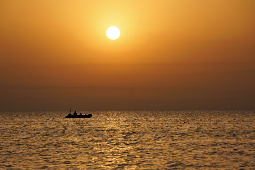 U.S. Army Spc. Michael Brown and U.S. Army Spc. Jonathan Nygaard, 2nd class divers assigned to the 74th Dive Detachment, begin a roving survey during the high tide near Abu Dhabi, Aug. 4, 2018. The Soldiers surveyed over 90,000 meters of water per site.
