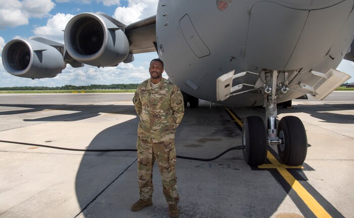 Tech. Sgt. Jasper Maple, 437th Aircraft Maintenance Squadron production team expediter, stands in front of one of Joint Base Charleston’s C-17 Globemaster IIIs Aug. 30, 2018. Maple has the most recorded flying hours of any flying crew chief who has been stationed at Joint Base Charleston, according to FCC manager records. With 4,422 flying hours and 1,194 days on temporary duty locations, ranging from day trips to neighboring states or week-long missions overseas, he has almost tripled the average of 1,500 flying hours normally garnered by his counterparts.