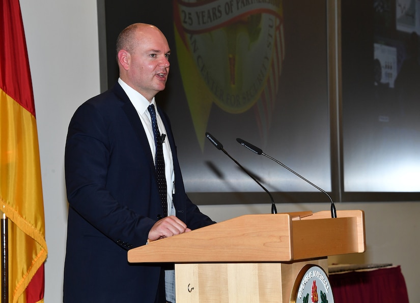 Thomas Alexander, the deputy assistant secretary of defense for Counternarcotics and Global Threats in the Office of the Assistant Secretary of Defense for Special Operations/Low-Intensity Conflict, gives the keynote address during the Program on Countering Transnational Organized Crime graduation ceremony held at the George C. Marshall European Center for Security Studies in Garmisch-Partenkirchen, Germany.