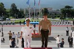 Marine Corps Gen. Joe Dunford, chairman of the Joint Chiefs of Staff, and Greek navy Adm. Evangelos Apostolakis, chief of the Hellenic National Defense General Staff, walk into the Greek defense ministry in Athens following a welcome ceremony.