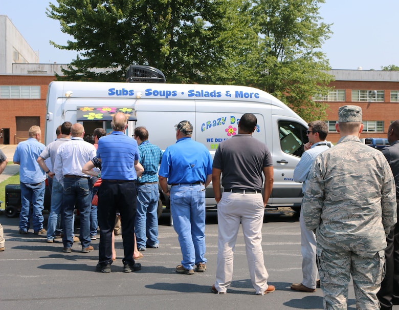 Arnold Air Force Base personnel line up to place their orders with Crazy Daisies. The Crazy Daisies food truck, located in the parking lot of the Main Auditorium, opened for business at Arnold AFB on Aug. 14. (U.S. Air Force photo by Bradley Hicks)