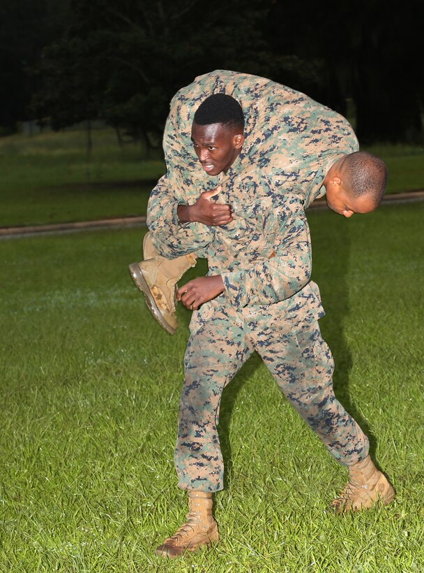 Marine Corps Logistics Command Marines participate in an annual combat fitness test