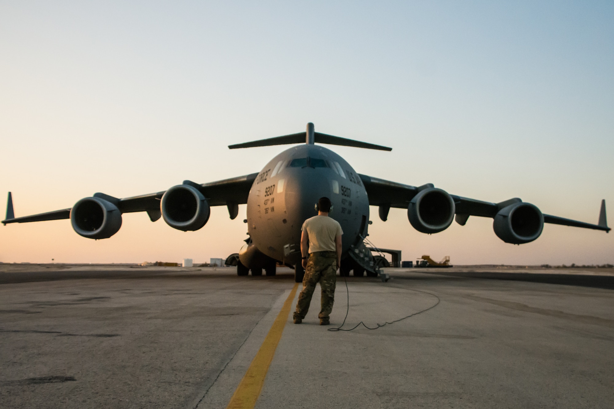 A C-17 Globemaster III is prepared for departure at an undisclosed location in Southwest Asia after transporting cargo between U.S. Africa Command and U.S. Central Command, Aug. 28, 2018. Al Udeid-based aircraft have completed nearly 15 missions this calendar year between the two commands. (U.S. Air Force photo by Tech. Sgt. Ted Nichols/Released)
