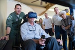 Capt. Jay Moore, a 560th Flying Training Squadron instructor pilot, helps demonstrate a virtual reality simulator Aug. 27, 2018 at Joint Base San Antonio-Randolph.