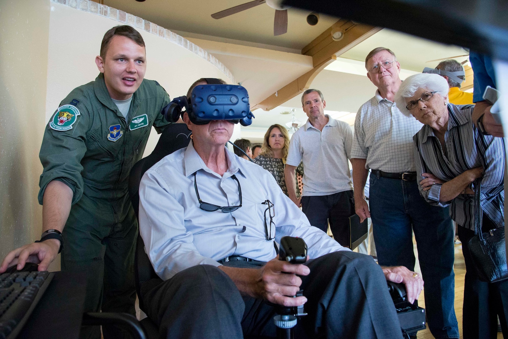 Capt. Jay Moore, a 560th Flying Training Squadron instructor pilot, helps demonstrate a virtual reality simulator Aug. 27, 2018 at Joint Base San Antonio-Randolph.