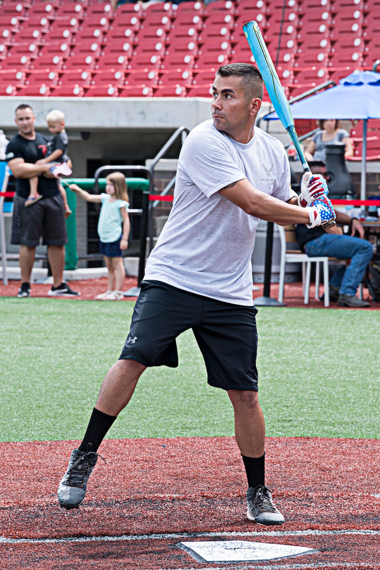 Tim Holmgren, 434th Security Forces Squadron, winds up for a big cut at a pitch during an inter-service homerun derby contest Aug. 18, 2018 at Kokomo Municipal Stadium, in Kokomo, Ind. Teams from the Army, Navy, Air Force and Marines engaged in the friendly competition. (U.S. Air Force photo/ Douglas Hays)