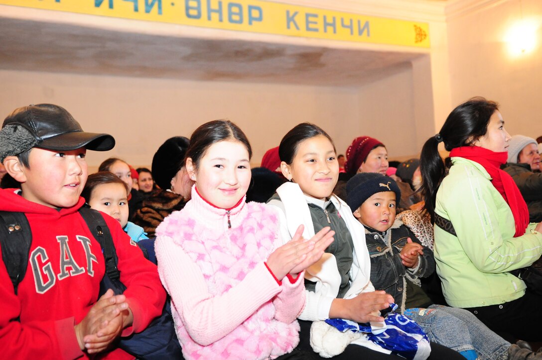Children from an orphange in Bishkek, Krygyzstan enjoy a performance by Celtic Aire