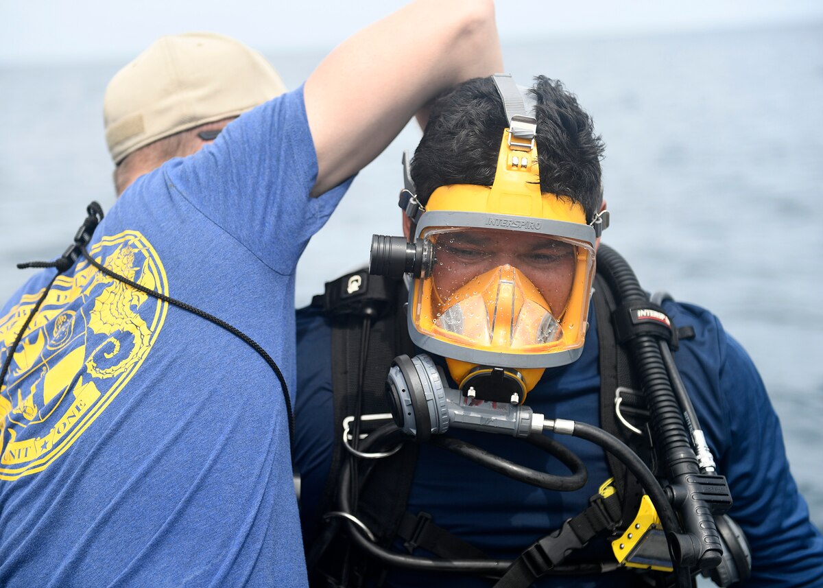 A U.S. Navy diver prepares to dive.