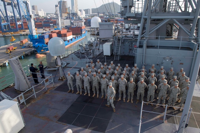 Colombian Marine Cadets stand in formation aboard USS Gunston Hall.