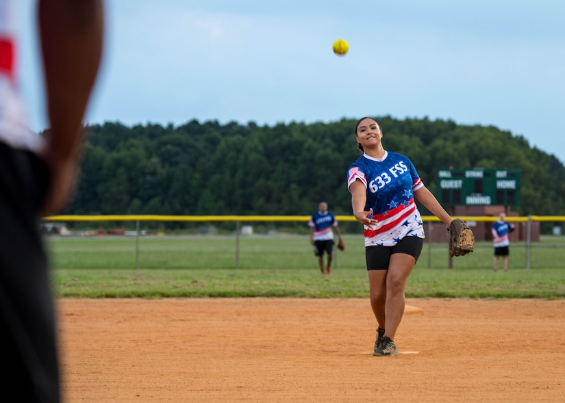 U.S. Air Force Airman 1st Class Daniella Cortez, 633rd Force Support Squadron commander support staff journeyman pitches the ball during the intramural softball championship at Joint Base Langley-Eustis, Virginia, Aug. 30, 2018.