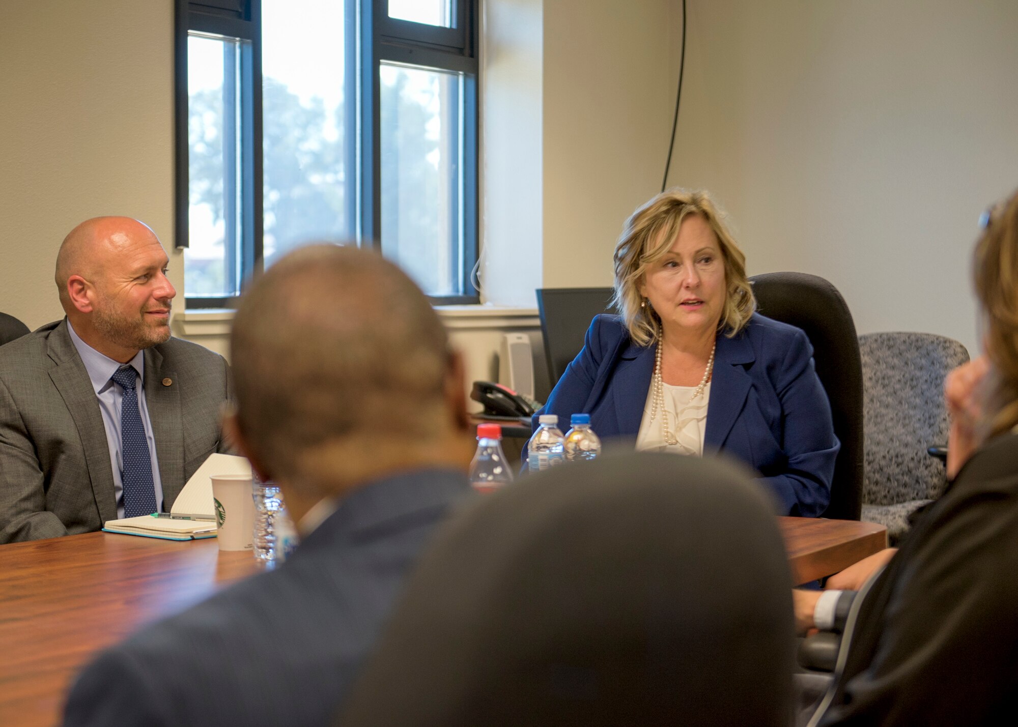 Ronna Garrett, Defense Civilian Personnel Advisory Service director, speaks with members of the DCPAS Wage and Salary Branch - Western Region office at Travis Air Force Base, Calif., Aug. 29, 2018. Garrett exercised her oversight responsibilities by visiting Travis and received feedback from DCPAS employees on a variety of topics. According to DCPAS website, the organization is responsible for the development and delivery of civilian personnel policies and human resources solutions that stengthen mission readiness. (U.S. Air Force photo by Lan Kim)