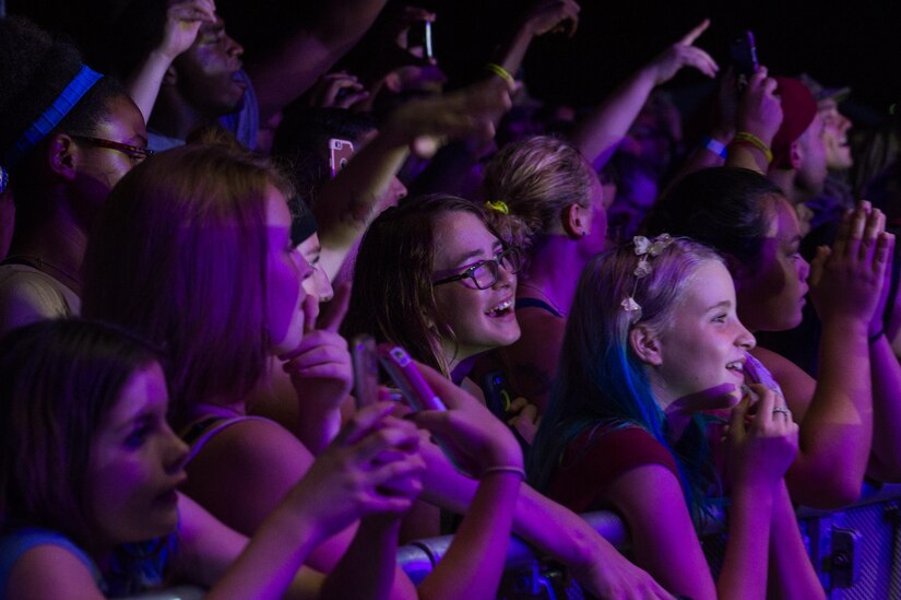 Spectators watch as the X Ambassadors perform during the End of Summer Music Festival at Joint Base Langley-Eustis, Virginia, Sep. 1, 2018.