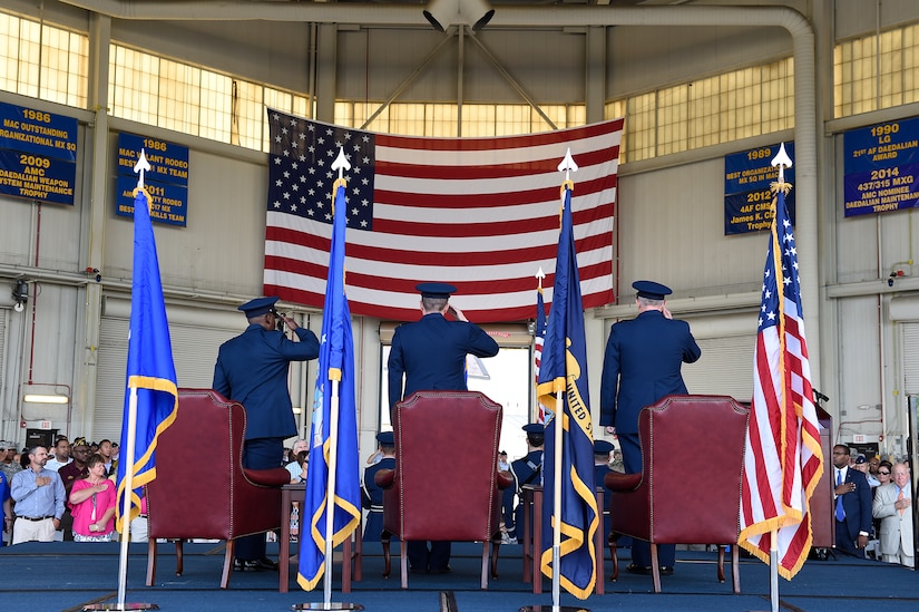 Right to left: Maj. Gen. John Gordy II, U.S. Air Force Expeditionary Center commander, Col. Jeffrey Nelson, outgoing 628th Air Base Wing commander and Joint Base Charleston commander, and Col. Terrence Adams, incoming 628th Air Base Wing commander and Joint Base Charleston commander, salute during the national anthem at a change of command ceremony Sept. 5, 2018, at Joint Base Charleston, S.C. Adams replaced Nelson as commander of the wing after serving at Scott Air Force Base, Ill., as Air Mobility Command’s director of communications and chief information officer. Joint Base Charleston is one of 12 Department of Defense joint bases and is host to over 60 DOD and federal agencies. The 628th ABW delivers installation support to over 90,000 Airmen, Sailors, Soldiers, Marines, Coast Guardsmen, civilians, dependents and retirees across four installations including the Air Base and Naval Weapons Station.