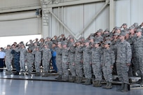 Members of Joint Base Charleston salute during the national anthem at a change of command ceremony Sept. 5, 2018, at Joint Base Charleston, S.C. During the ceremony, Col. Terrence Adams replaced Col. Jeff Nelson as 628th Air Base Wing commander and Joint Base Charleston commander. Joint Base Charleston is one of 12 Department of Defense joint bases and is host to over 60 DOD and federal agencies. The 628th ABW delivers installation support to over 90,000 Airmen, Sailors, Soldiers, Marines, Coast Guardsmen, civilians, dependents and retirees across four installations including the Air Base and Naval Weapons Station.
