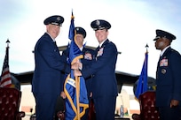 Col. Jeff Nelson, center right, relinquishes command of the 628th Air Base Wing and Joint Base Charleston to Maj. Gen. John Gordy II left, U.S. Air Force Expeditionary Center commander, during a change of command ceremony Sept. 5, 2018, at Joint Base Charleston, S.C. Col. Terrence Adams, right, replaced Nelson as commander of the wing and joint base. Joint Base Charleston is one of 12 Department of Defense joint bases and is host to over 60 DOD and federal agencies. The 628th ABW delivers installation support to over 90,000 Airmen, Sailors, Soldiers, Marines, Coast Guardsmen, civilians, dependents and retirees across four installations including the Air Base and Naval Weapons Station.