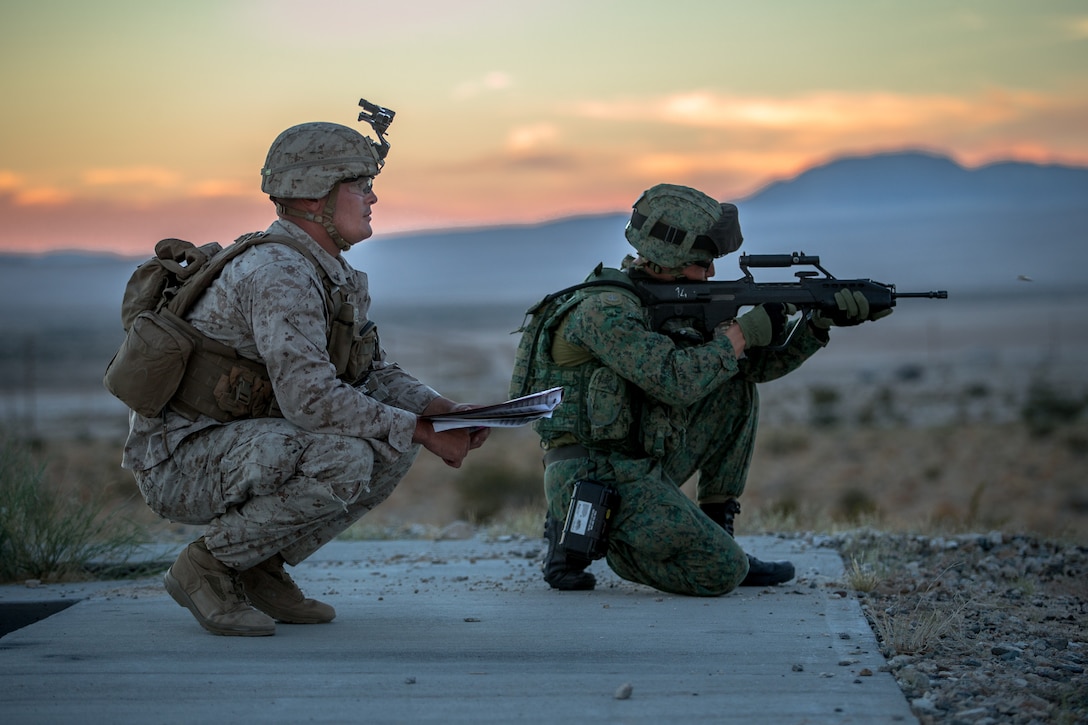 U.S. Marine Corps LCpl. Keifer Galliher, an infantry marine with 2nd Battalion, 7th Marine Regiment, oversees U.S. Marine Corps marksmanship training to Soldiers from the Singapore Armed Forces during exercise Valiant Mark 2018 at Marine Corps Air-Ground Combat Center Twentynine Palms, Calif. Aug. 29, 2018. Valiant Mark is an annual exercise conducted by U.S. Marines and the Singapore Armed Forces designed to facilitate increased interoperability and strengthen military-to-military relationships through combined-arms integration training.